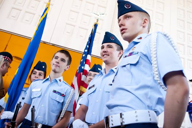 The Las Vegas Composite Squadron Color Guard of the Civil Air Patrol prepares to present the colors during the 48th Annual Memorial Day Service at the Palm Downtown Mortuary and Cemetery in Las Vegas, Monday, May 27, 2013.